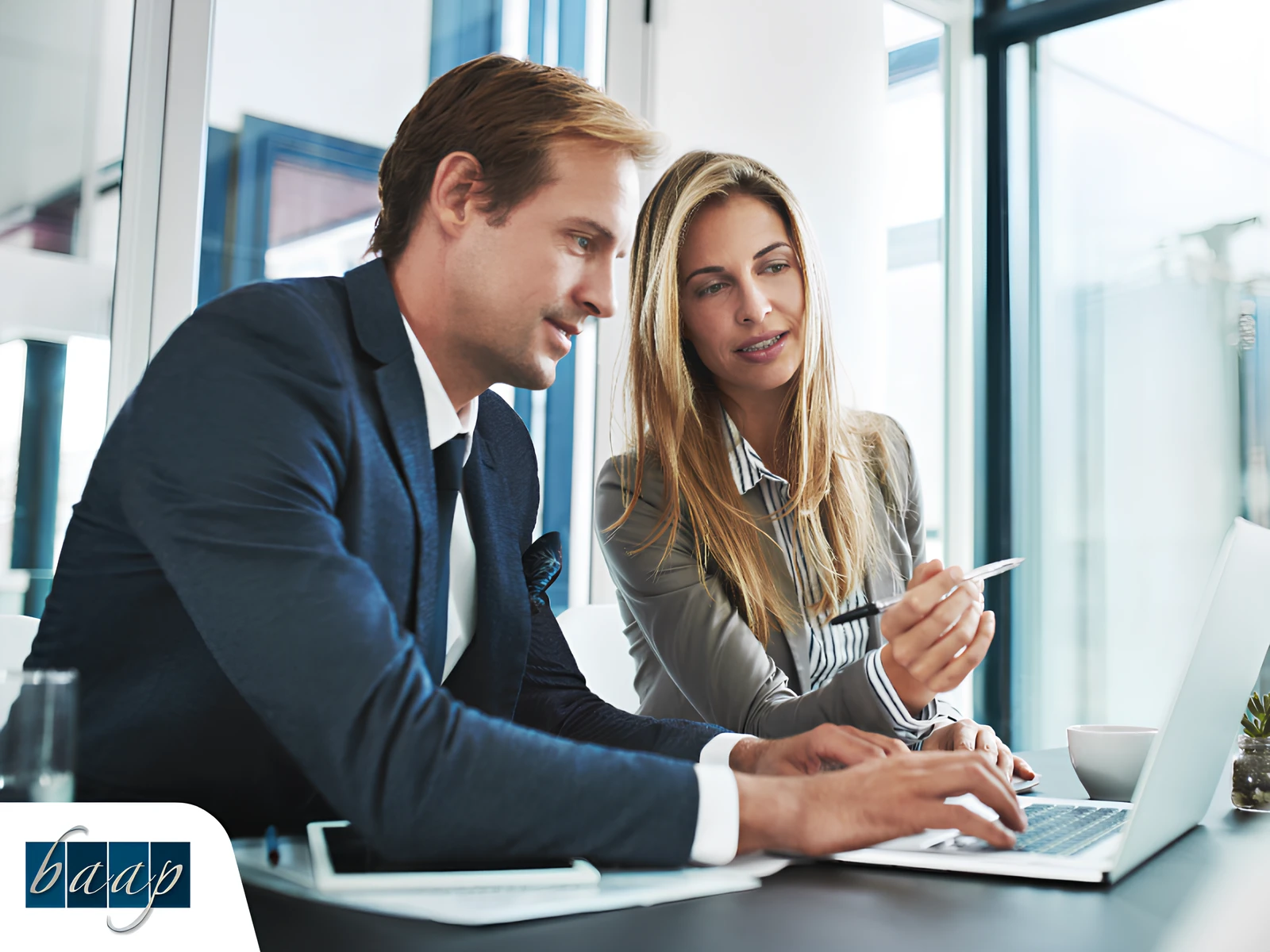 Business advisor discussing recordkeeping strategies with client